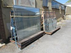 Two metal 'A' frame forkliftable double sided glass racks, approx. 2.2m x 1.2m (excluding contents)