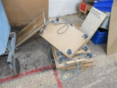 Seven various sized wooden dollies
