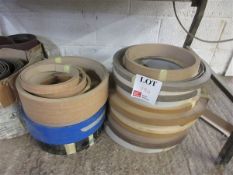 Twenty various sized and coloured rolls of edge banding