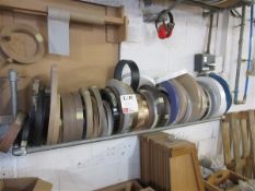 Fifty four various sized and coloured rolls of edge banding
