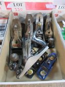 Seven various sized hand held planers