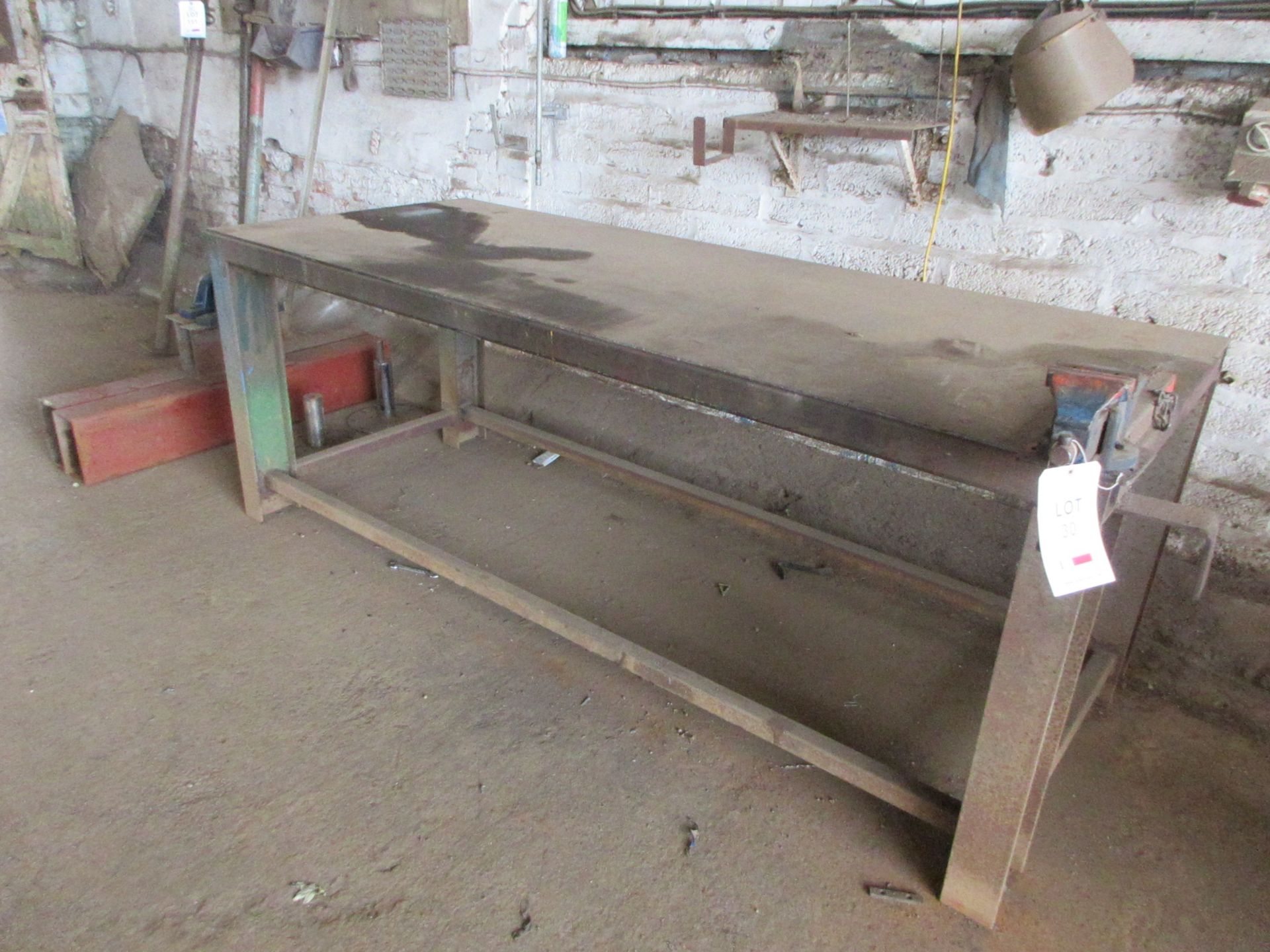 Metal frame/top work bench, size 2.5m x 1m with 4" bench top vice (excluding contents)