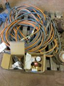 Two oxy-acetylene gas cutting tools, hoses and regulators