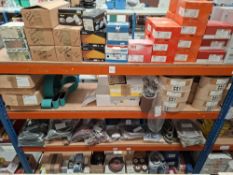 Contents of bay to include sanding belts and wheels of various sizes