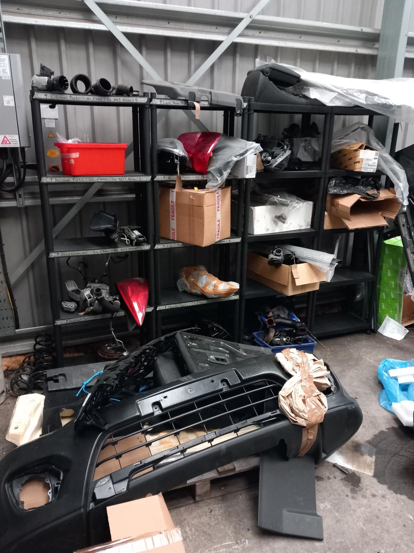 Assortment or used or spare car parts and accessories (head lamps, bumpers etc) with engine