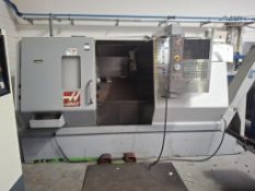 Haas SL-30TCE CNC lathe with Jorgensen swarf conveyor (3 phase)