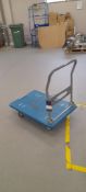 Flat bed trolley. Located on second floor, access by goods lift and stairs
