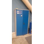Steel double door cabinet with contents of PPE. Located on ground floor