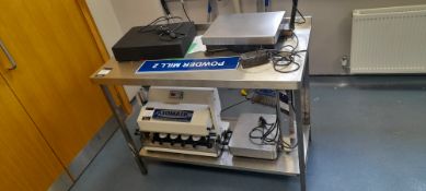 Stainless steel table (excludes contents). Located on first floor, access by goods lift and stairs