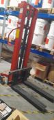 Warrior 1S-E1030 1000kg electric pallet stacker, Serial Number Y14010084. Located on ground floor