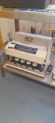 Axomatic AX020 filling machine, Serial Number 005-201, Year 2010. Located on first floor, access