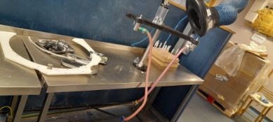 Stainless steel table with bespoke filling machine. Located on first floor, access by goods lift and