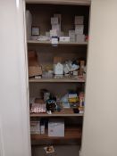 Contents of 2 cupboards to include various stationery and electrical components