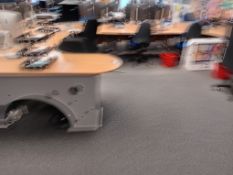 Very large multi-section straight and curved office desks with approximately 15 operators chairs (