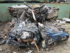 4 Bailed crushed vehicles