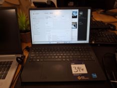 Dell Vostro 15 3510 laptop computer with charger.