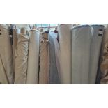 Approximately 35 rolls of various fabric by various companies in various lengths