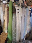 Approximately 40 various length and design rolls of fabric