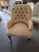 Victorian deep button backed armchair