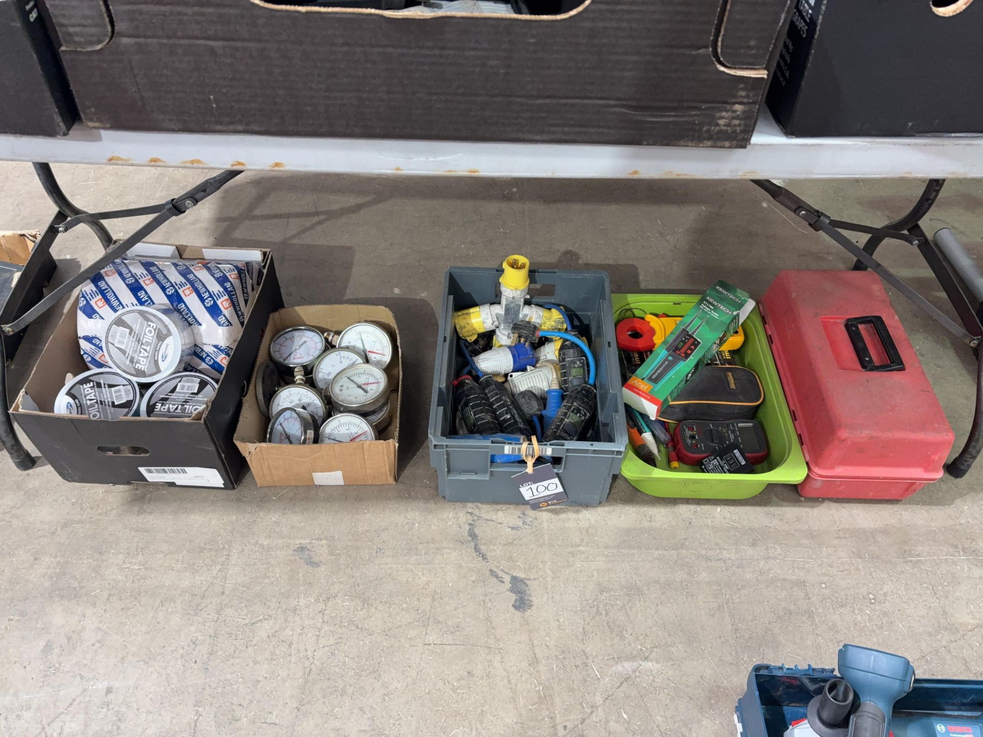 Miscellaneous items including rolls of foil tape, pressure gauges, plumbing parts etc