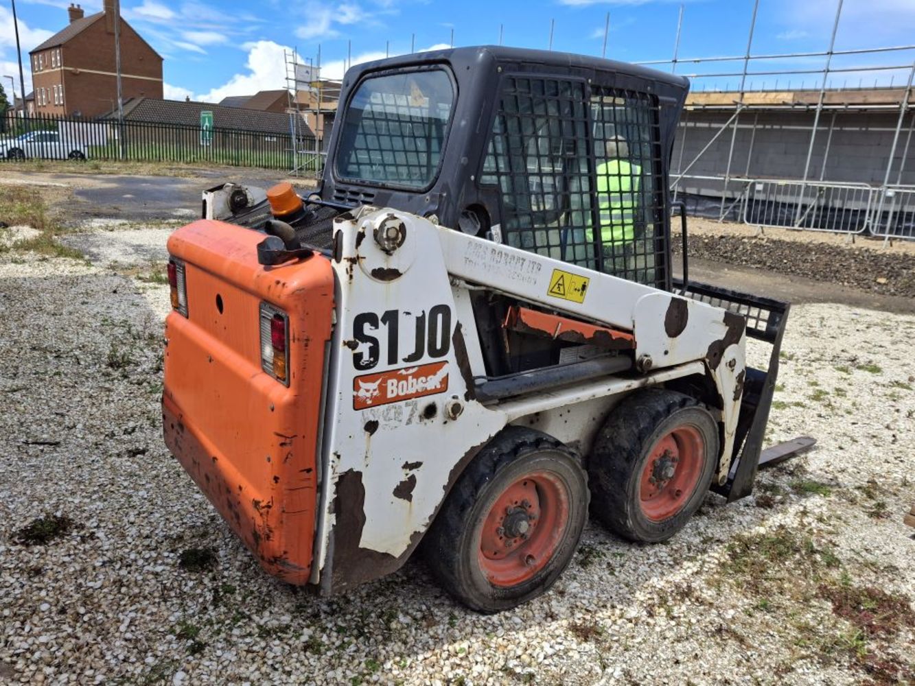 Bobcat Compact Skid Steer, Shipping Container and Volkswagen Panel Van