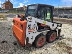 Bobcat Compact Skid Steer, Shipping Container and Volkswagen Panel Van