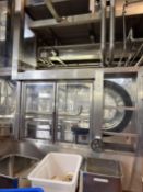 Isoma bottle de-elevator, approx. 5 metre drop down with approx. 7 metre feed to filler. This lot is