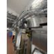 Amech High level conveyor. Approx 60 metres motorised conveyor transporting the 6 x 4 pint milk from - Image 1 of 13