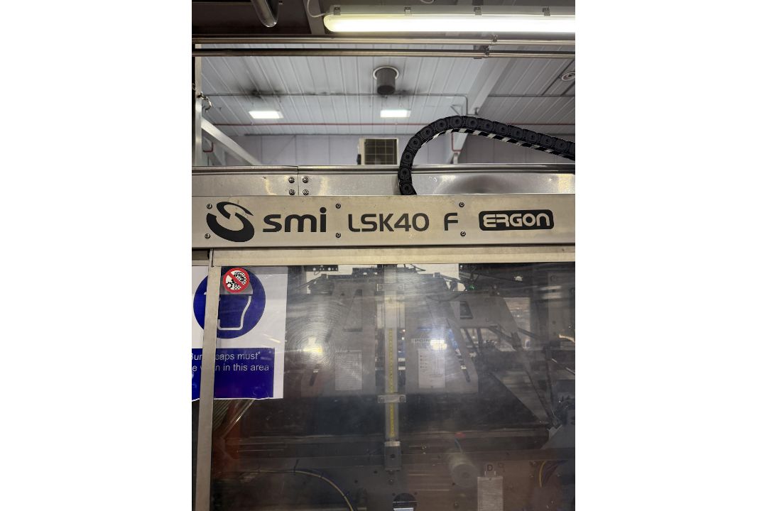SMI Overwrapper and Shrink Tunnel. SMO DV500S Ergon Divider. SMI LSK40F Shrinkwrapper feeding Heat T - Image 13 of 25