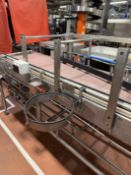 Inline Full Bottle conveyors. Conveyors from Filling to Trolley Packers with Heuft Lane Bottle diver