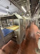 SMI Overwrapper and Shrink Tunnel. SMO DV500S Ergon Divider. SMI LSK40F Shrinkwrapper feeding Heat T