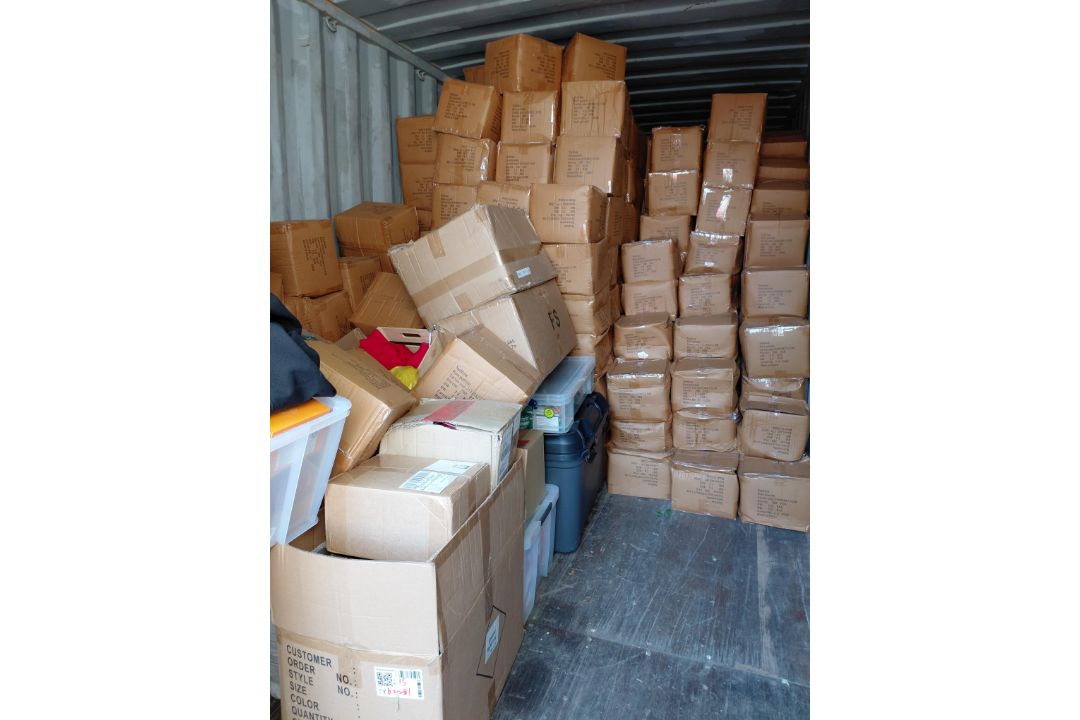 Contents of Container to Include: Large Quantity of Rain Ponchos, Quantity of Seasonal Props (Exclud - Image 1 of 9