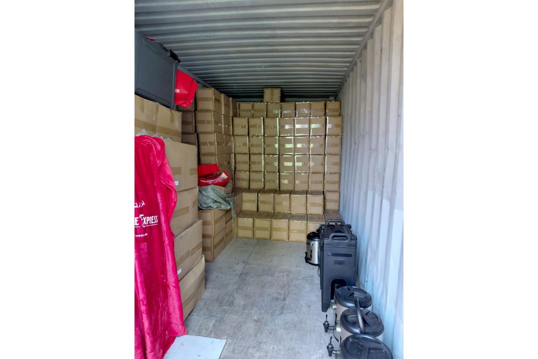 Contents of Container to Include: Large Quantity of Wired Headphones, Blankets and Santa Hats (Exclu - Image 1 of 12