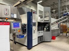 Krones Type S12M Bottle Blow Moulder for pre-formed stock. Incudes Pallet Tipper, Stainless Steel Ho