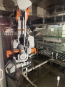 Line 11 - IWKA TFS 80-6 Paste Filling unit with automated tray unloading by ABB 4400 Robot and IRB 4