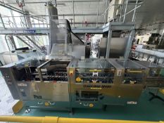 Line 17 Pace Omni M400 Bottle Sorter. Sorts and feeds empty bottles to filler. Located on 1st floor.