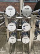 SS Powder Delivery hose store and rack. Mounted on SS Frame, all tubes lockable, 6 tubes on rack.