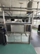 Line 17 DMP Empty bottle hopper with large hopper with feed conveyor along the bottom feeding flight