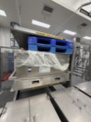 Pallet Invertor with safety Cage and Light Guards. Footprint including cage 3.6 x 3.4m