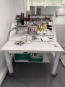 Development test Rig/Table. Mobile with small underslung drawer. Height adjustable and top on rachet