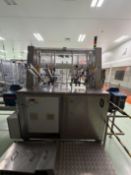 Arenco Packovation Tray Erector forming bottom trays and lids for the Toothpaste filling line with 2