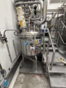 316 SS Detergent Tank approx 1000 ltr with top agitator.