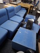 Blue upholstered modular seating with 4 panels, 3 tables and 3 seater sofa