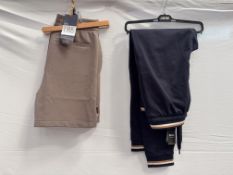 A pair of Armani Exchange shorts (S) and a pair of Hugo Boss tracksuit bottoms (M)