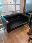 Black faux leather two seater reception sofa with a black faux leather single seater reception chair