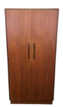 G Plan 'Fresco' Teak Double Wardrobe, designed by Victor Wilkins, the twin doors enclosing a hanging
