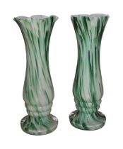 A matched pair of Bohemian green and white cased art-glass vases, probably Franz Welz, circa 1920s–