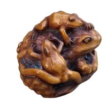 A Japanese carved wood netsuke of a toad and young, Meiji period, late 19th/early 20th century,