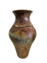 An American studio pottery stoneware vase by ceramicist David Holleman,of baluster form with a