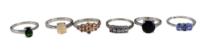A collection of 925 silver gem-set rings, comprising a chrome diopside solitaire ring, size R½; an